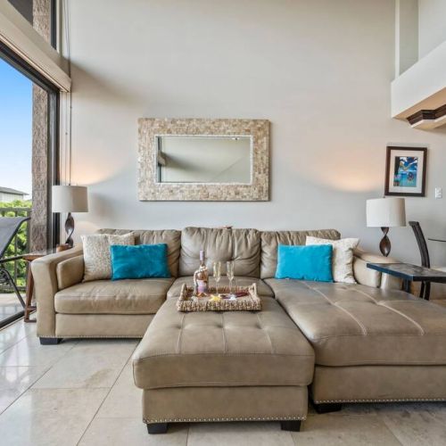 Large leather sofa sectional in living room.