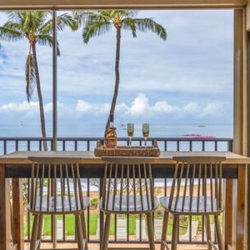 Private lanai seating with a view. Cheers to your Maui memories