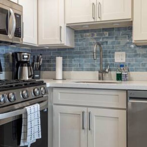 Beautifully remodeled fully equipped kitchen with stainless appliances.