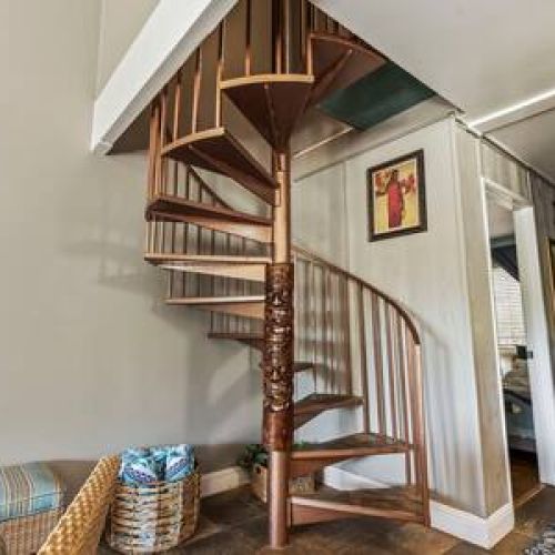 Sprial staircase leading to upstairs bedroom