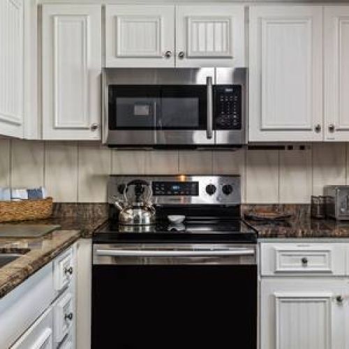 Fully equipped kitchen features stainless appliances