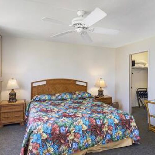 King size bed with usb chargers and a walk in closet