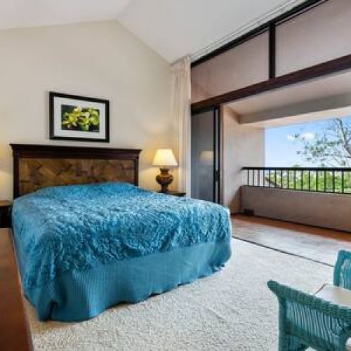 Spacious upstairs primary bedroom and private lanai