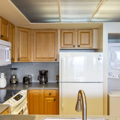 Fully equipped kitchen with needed essentials.