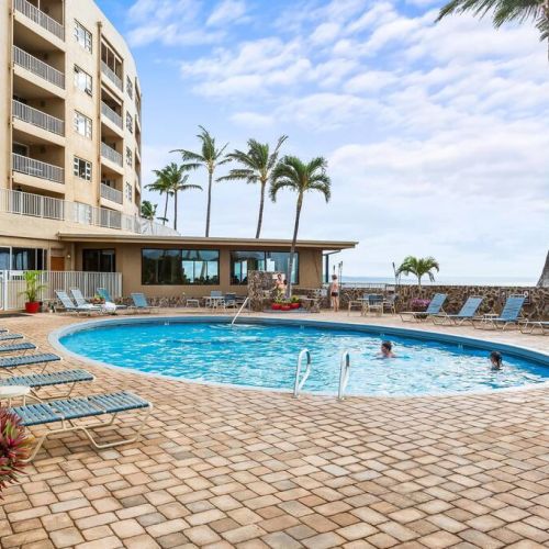Pool area with plenty of seating.