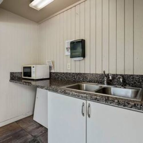 Outdoor kitchen area by pool