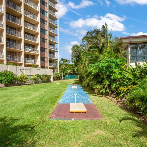 Shuffle board in the grassy area