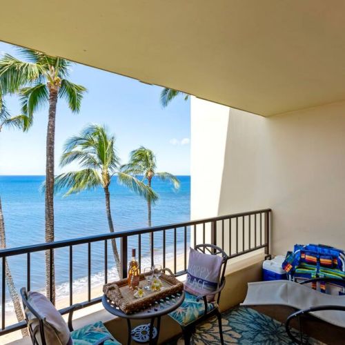 Lanai features your beach gear and table for two, sun lounger, and egg swing.