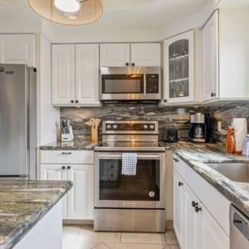 Updated kitchen with stainless appliances