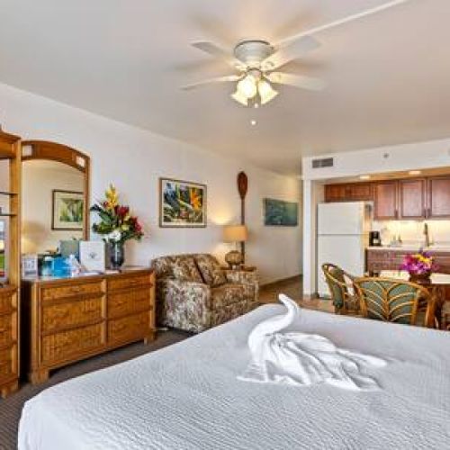 Perfectly appointed studio with ceiling fan, smart TV with cable, and beach gear