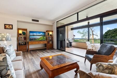 Comfortable sunken living room with a view
