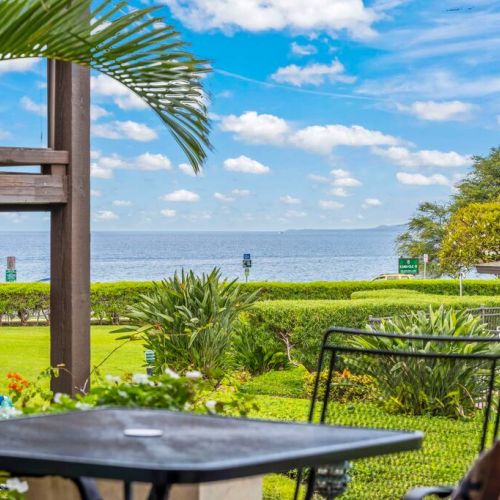 Ocean view from lanai. Admire sunsets, whale watching, and sailboats  from this ground floor gem.