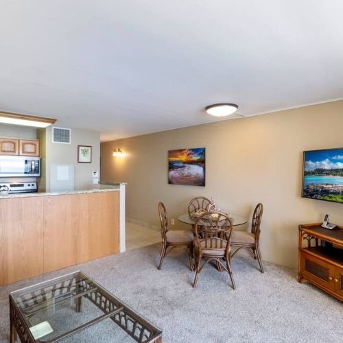 Dining table for 4, Smart TV with cable, and more.