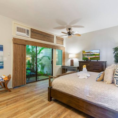 Window AC in bedroom that also features your own private lanai off the bedroom.