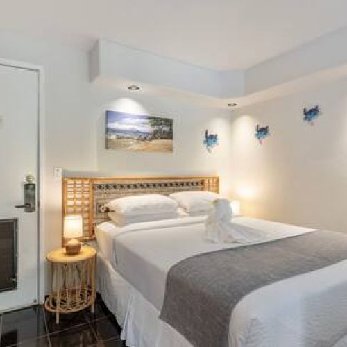 Queen size bed, and nightstands with usb chargers.