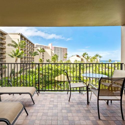 2 sun loungers and dining table from your private lanai.