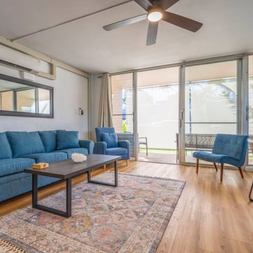 Living features split AC system, sofa sleeper, Smart TV with cable, and plenty of seating