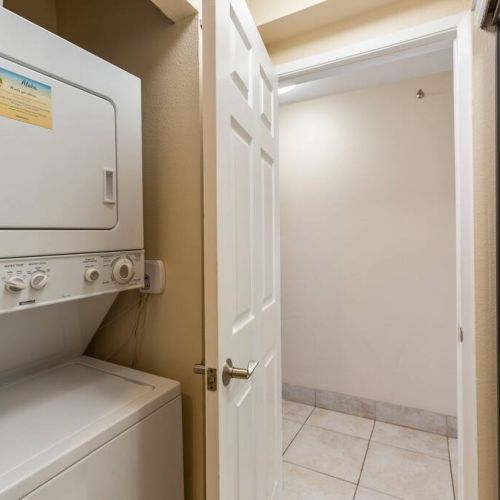 In unit washer/dryer with pods and fabric sheets