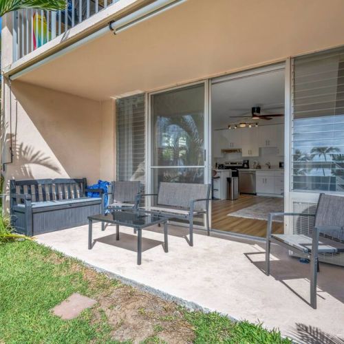 Large lanai with plenty of seating and beach gear for your use.