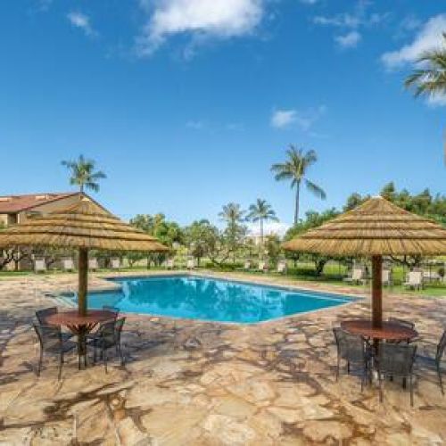 Large pool and spa area with plenty of seating