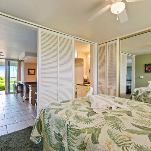 Bedroom has sliding door from living room and en suite bathroom