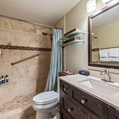 Remodeled walk in ADA shower with all the amenities courtesy of Stay Aloha.