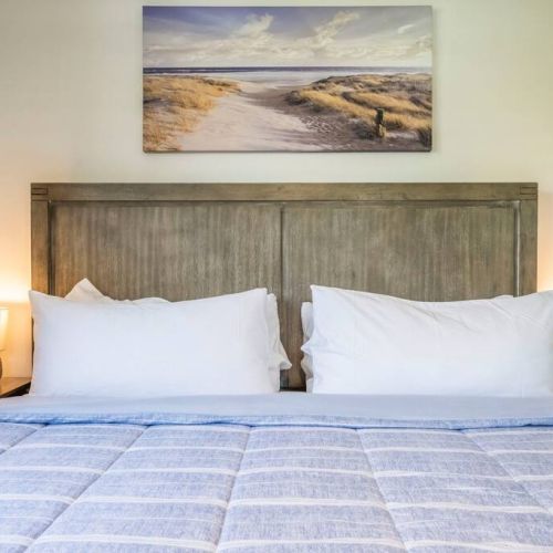 Nightstands feature usb charging ports and plug ins.
