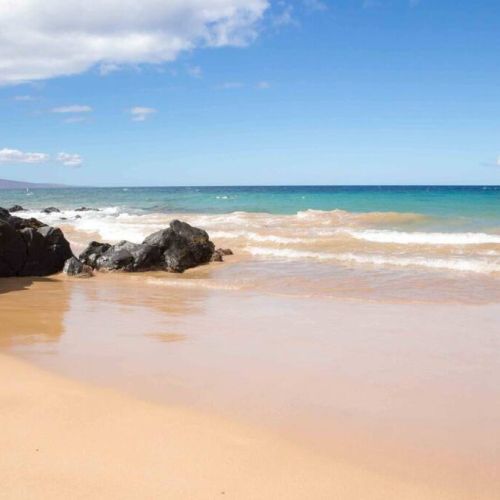 Enjoy the perfect sandy beach at Kam III right across the street.