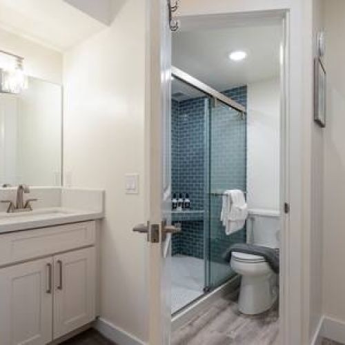 Beautifully remodeled bathroom with all needed essentials courtesy of Stay Aloha.