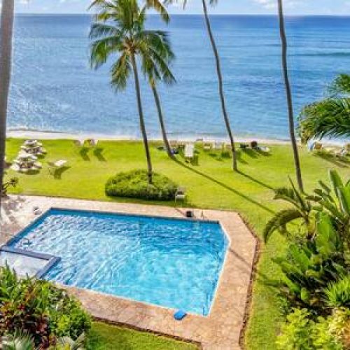 Beautiful oceanfront pool and spa area with BBQ