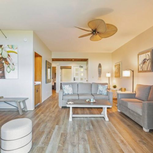 Sofa sleeper in living room to go with a loveseat and 2 sitting chairs with ottomans.