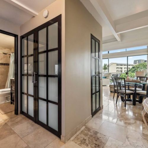 Bathroom is located downstairs off the entrance