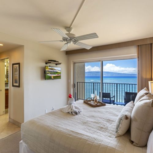 Lay in your king size bed and admire Molokai island and watch some TV