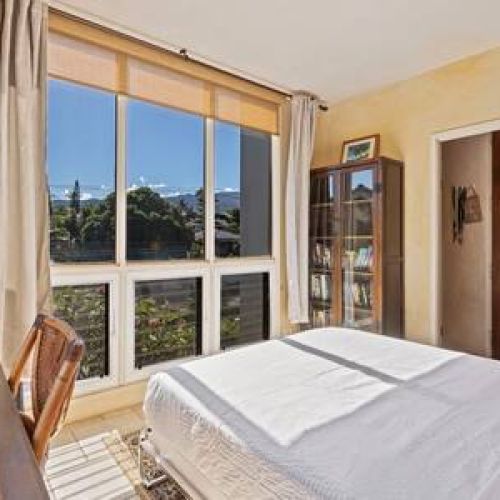 Bedroom also has a small work desk area and views of the beautiful greenery