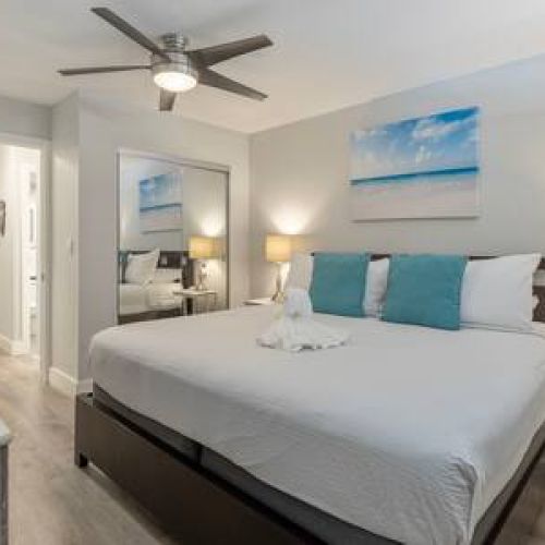 King size bed, ceiling fan, closet space, usb chargers, and TV with cable