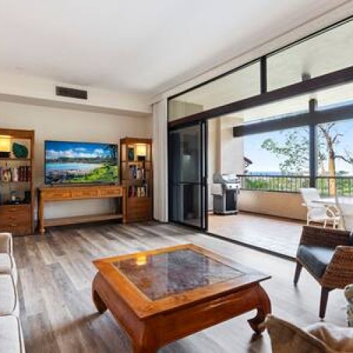 Comfortable sunken living room with a view