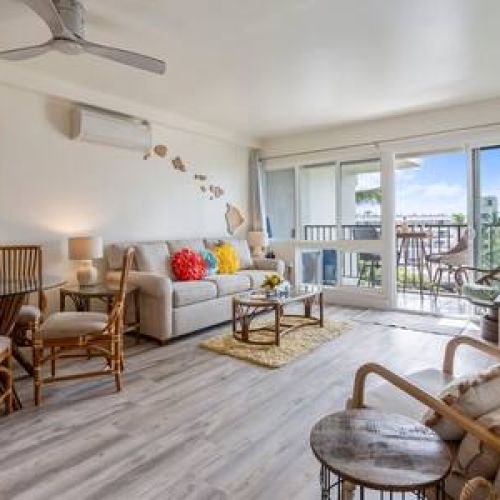 Plenty of sitting areas in the living room with lots of natural light.
