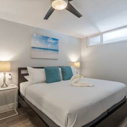 King size bed, ceiling fan, closet space, usb chargers, and TV with cable